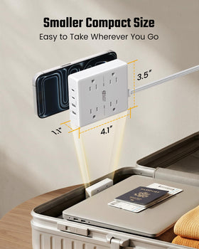 SUPERDANNY power strip in a home office charging multiple devices neatly