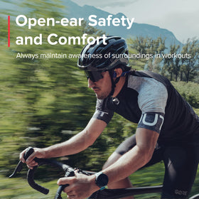SUUNTO Aqua open-ear design shows ears remain open for situational awareness while swimming.