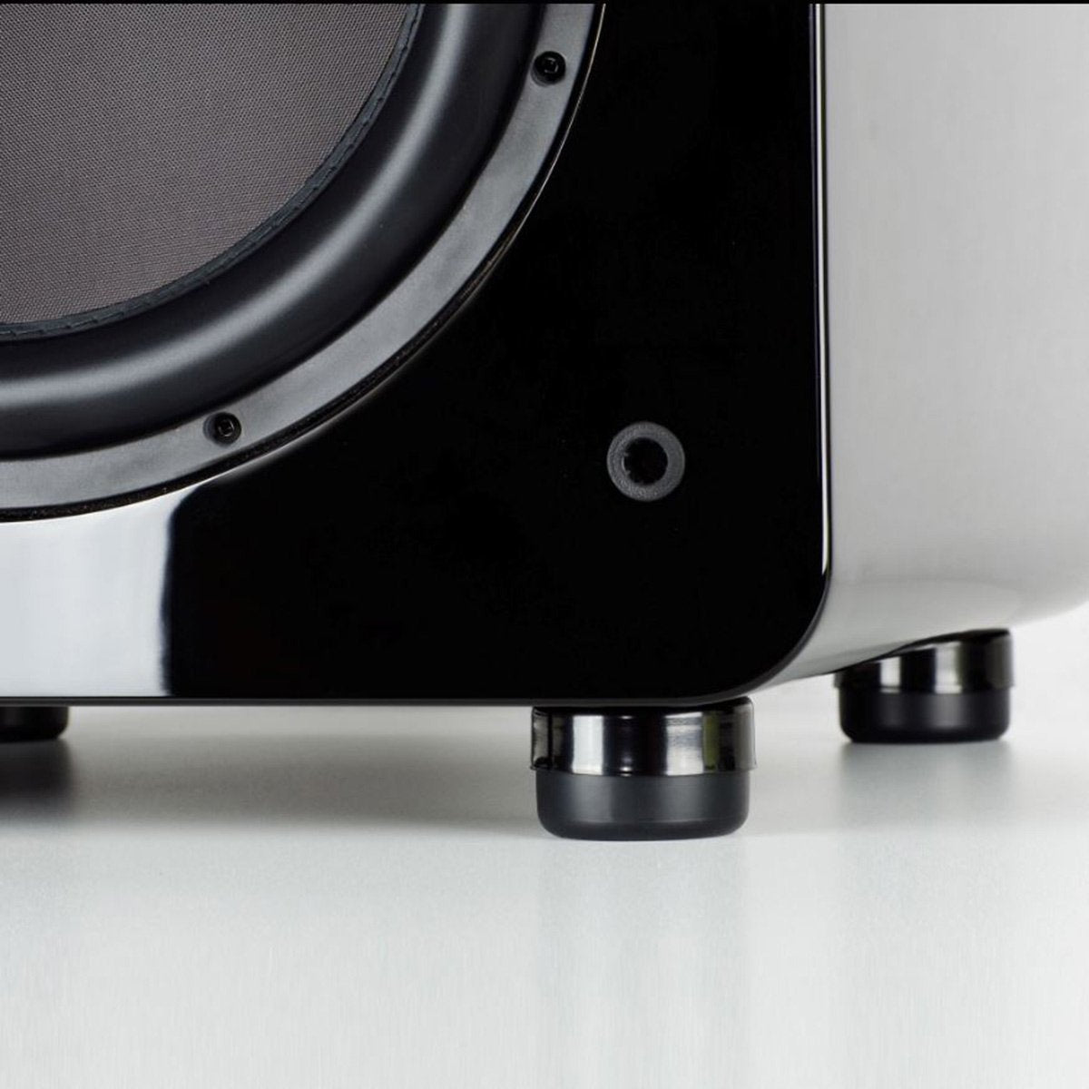 SVS SoundPath installed on a subwoofer showing stable, cleaner bass in a living room