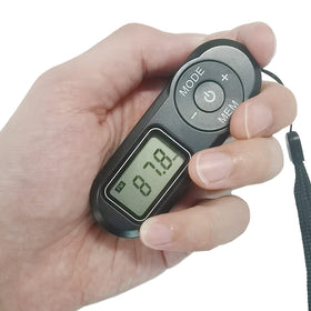 SWDSTP mini pocket radio with headphones for private listening.
