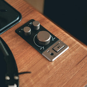 Syitren Paron turntable top close-up showing tonearm and AT3600 cartridge.
