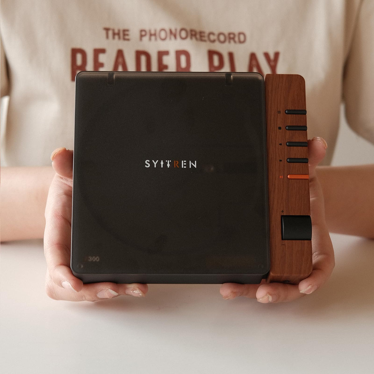 Syitren R300 retro desk setup highlights portable convenience for living spaces.