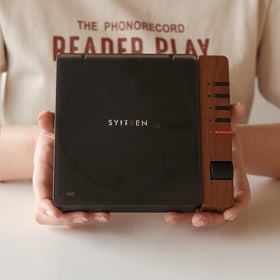 Syitren R300 retro desk setup highlights portable convenience for living spaces.