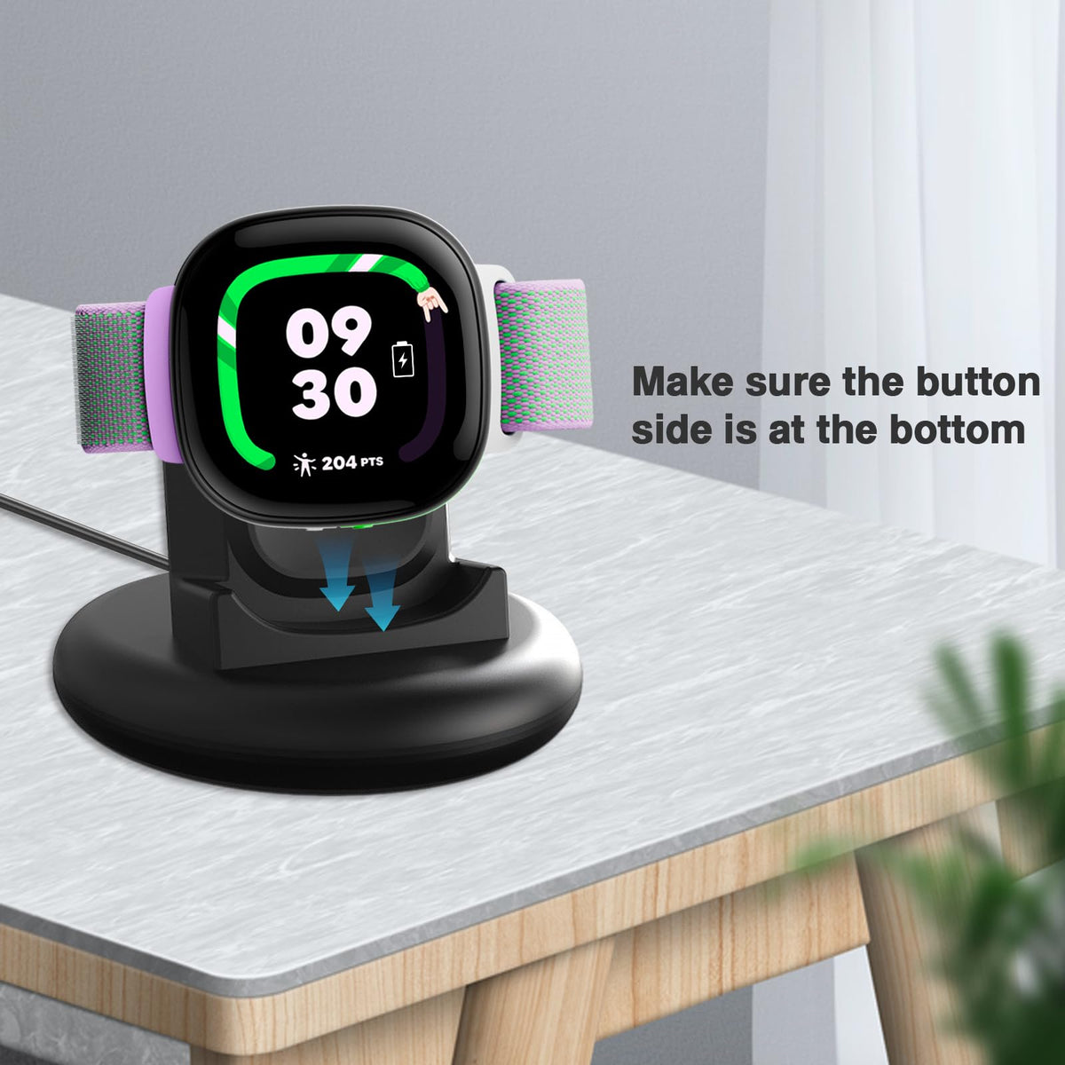 Sylacor dock on a nightstand with a Fitbit Ace LTE in use.