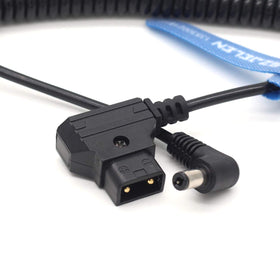 SZJELEN coiled cable beside ruler for scale showing compact storage and extendable reach