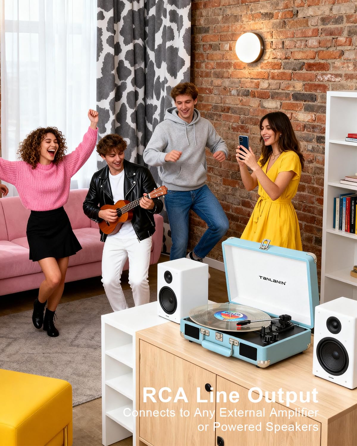 TANLANIN record player in a picnic setting demonstrating portable entertainment benefit