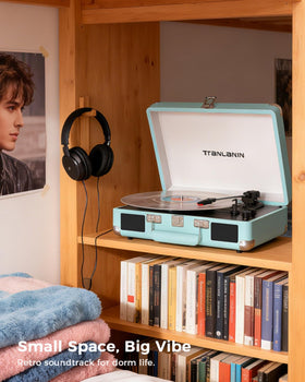 TANLANIN size comparison beside a vinyl LP showing compact travel‑ready benefit