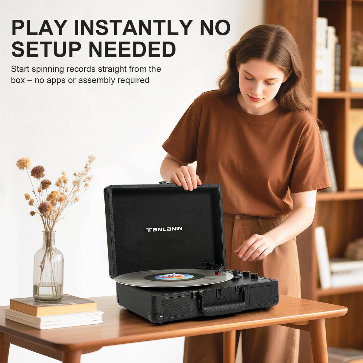 TANLANIN size comparison with a vinyl record showing scale and compatibility with records