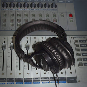 Tascam TH-MX2 in studio usage on a mixing console demonstrating isolation and accurate monitoring