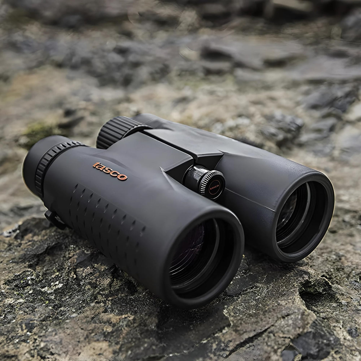 TASCO ES10X42 held in hand to show lightweight scale and comfortable carry benefit