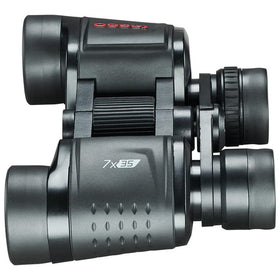 TASCO held in a hand showing size and steady 7x viewing for comfortable handling