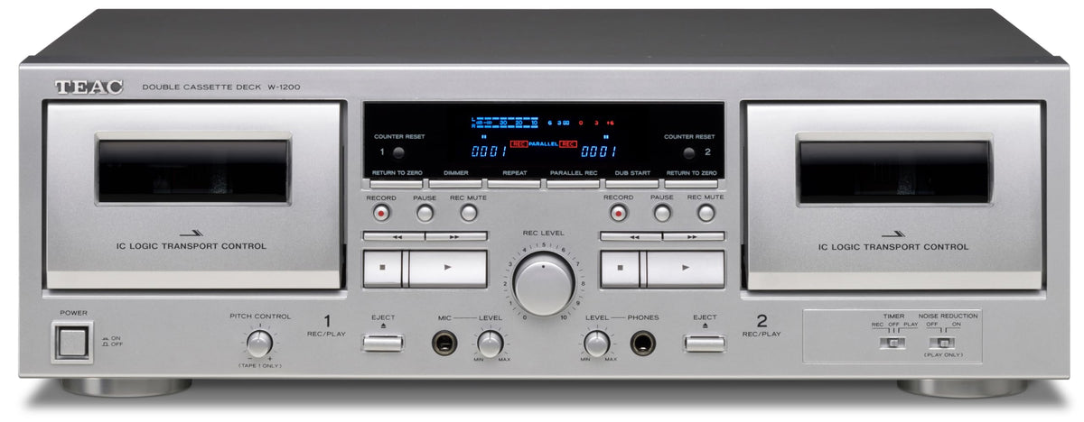 Teac W-1200 dual cassette deck front view in silver, ideal for playback and recording.
