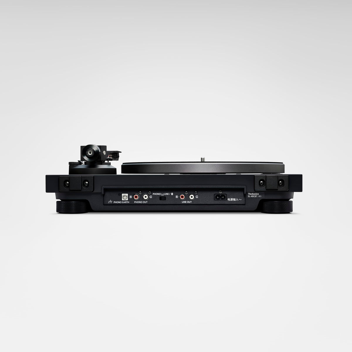 Technics SL-40CBT-K tonearm and cartridge close-up shows precision engineering.
