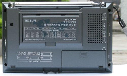 TECSUN R9700DX close-up of tuning knob, band selector and back-lit display for precise station selection