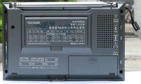 TECSUN R9700DX close-up of tuning knob, band selector and back-lit display for precise station selection