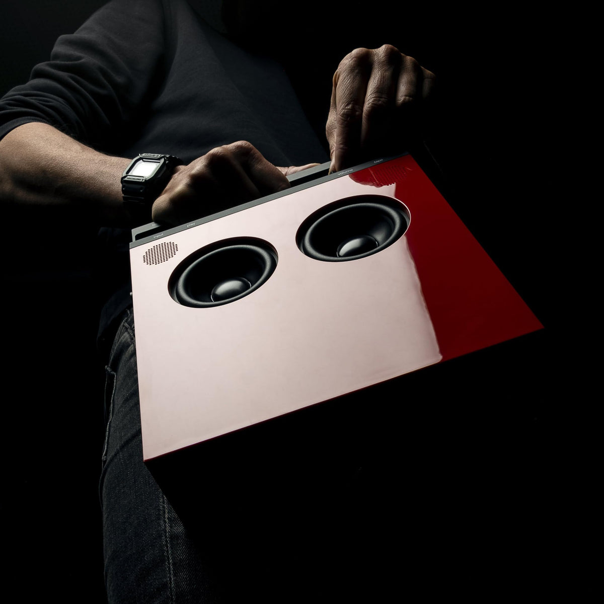 Teenage Engineering OB-4 controls red highlighting tactile interaction and remix features