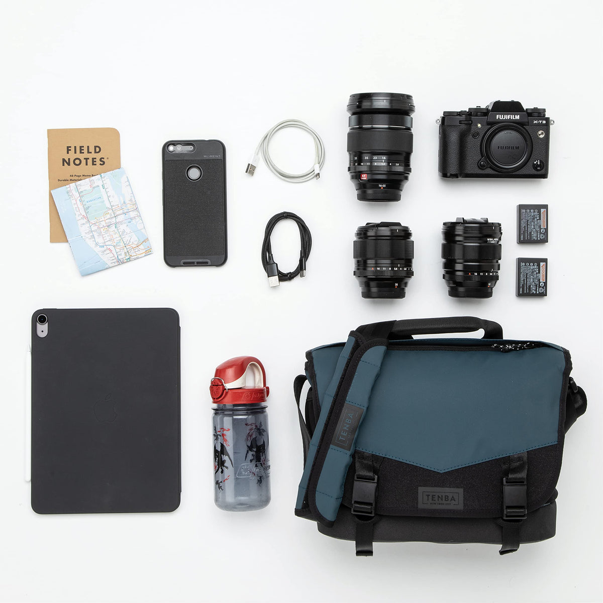 Tenba DNA 13 blue interior showing camera and lenses, organized for easy retrieval.