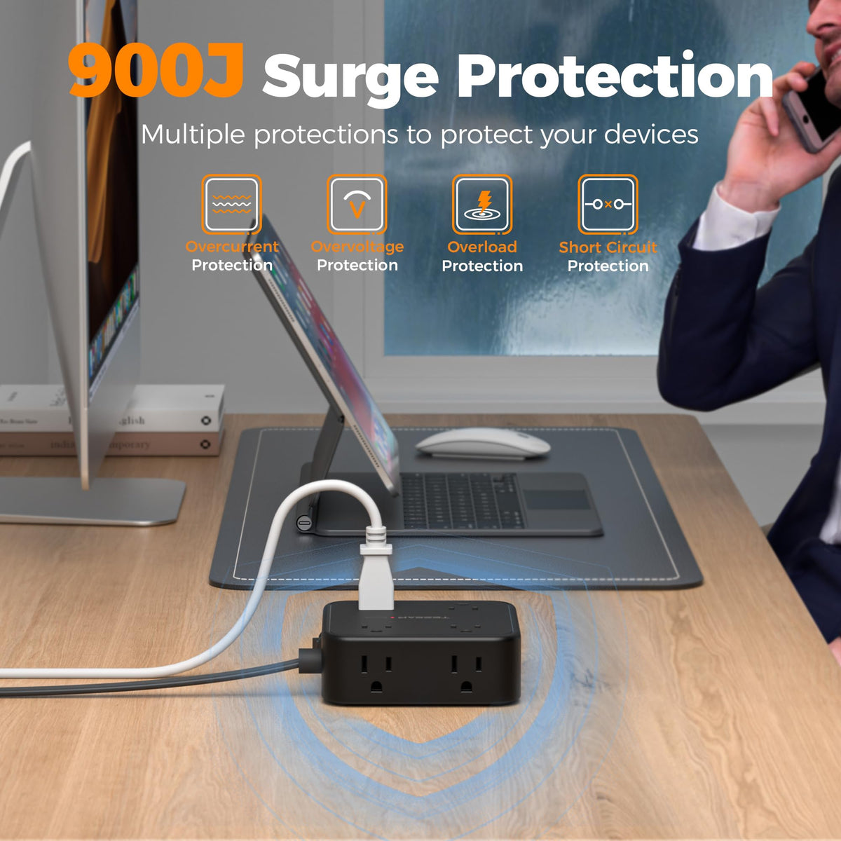 TESSAN powering laptop and phone on desk showing organized charging