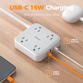 TESSAN power strip in a desk setup charging laptop and phone for clutter reduction benefit