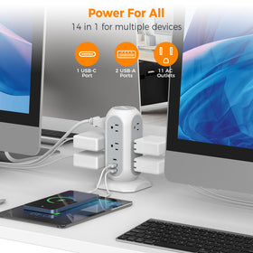 TESSAN in use on a home office desk powering laptop, monitor and accessories