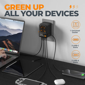 TESSAN plugged into hotel wall powering phone and laptop for travel convenience