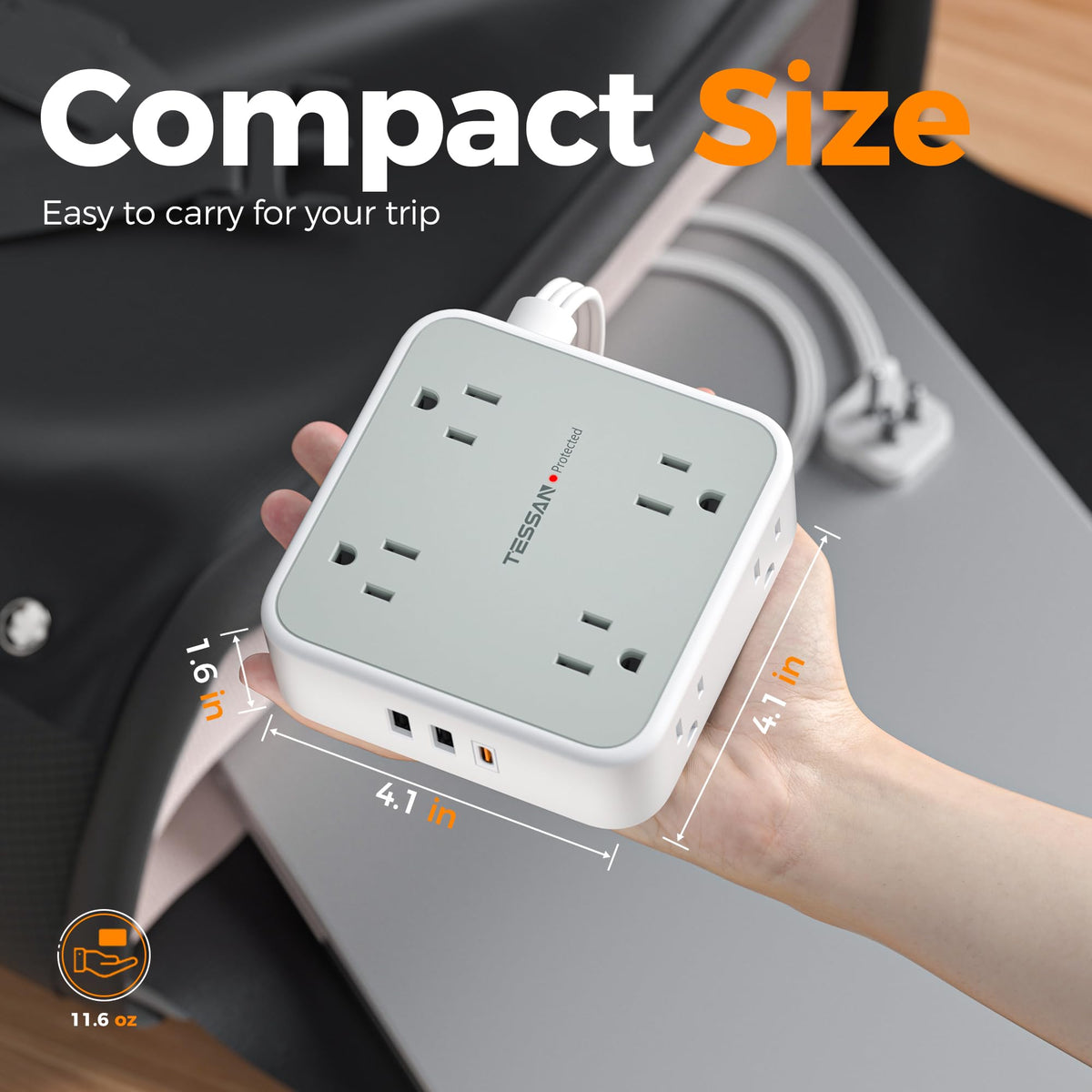 TESSAN in use on desk powering laptop, monitor and charging devices neatly