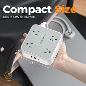 TESSAN in use on desk powering laptop, monitor and charging devices neatly