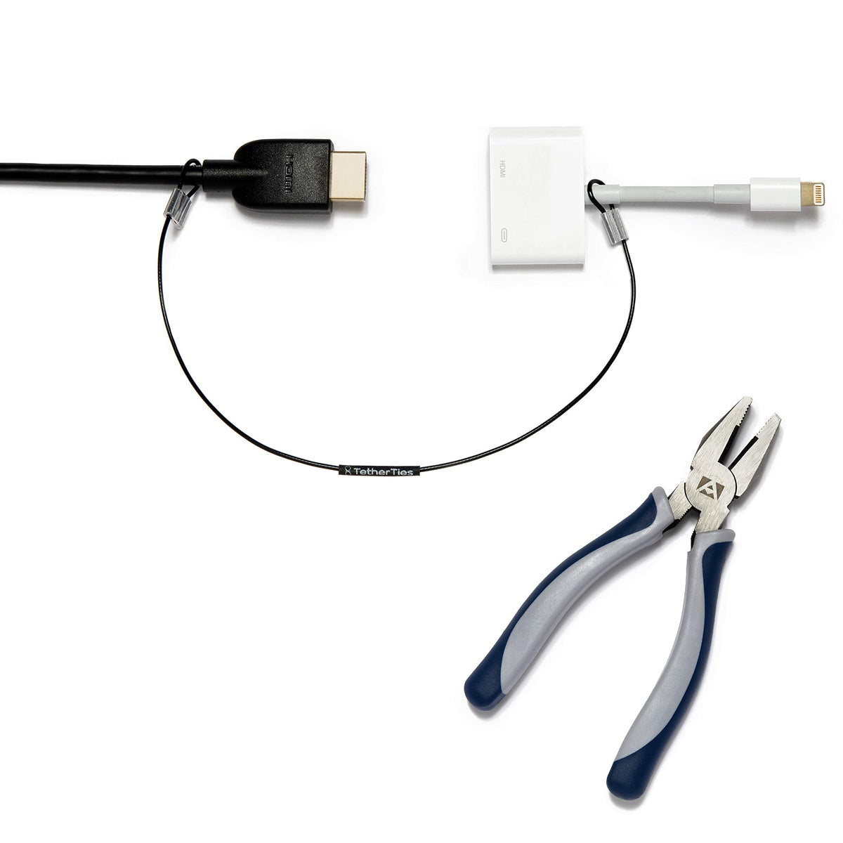 TetherTies secures a dongle with cable lock on a desk.