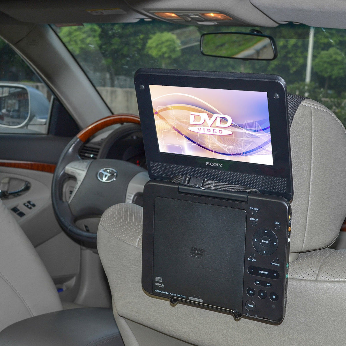 TFY car headrest mount setup secures 7-10 inch DVD players for backseat viewing.