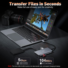 THANDBLE next to a pen showing scale and portability for travel-ready setup