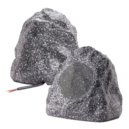 Theater Solutions 2R4G granite rock speaker on a patio for outdoor sound