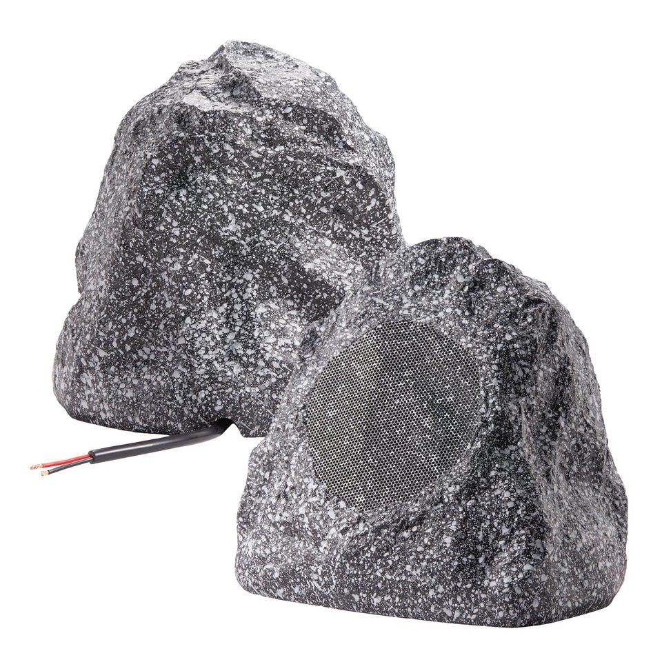 Theater Solutions 2R4G granite rock speaker on a patio for outdoor sound