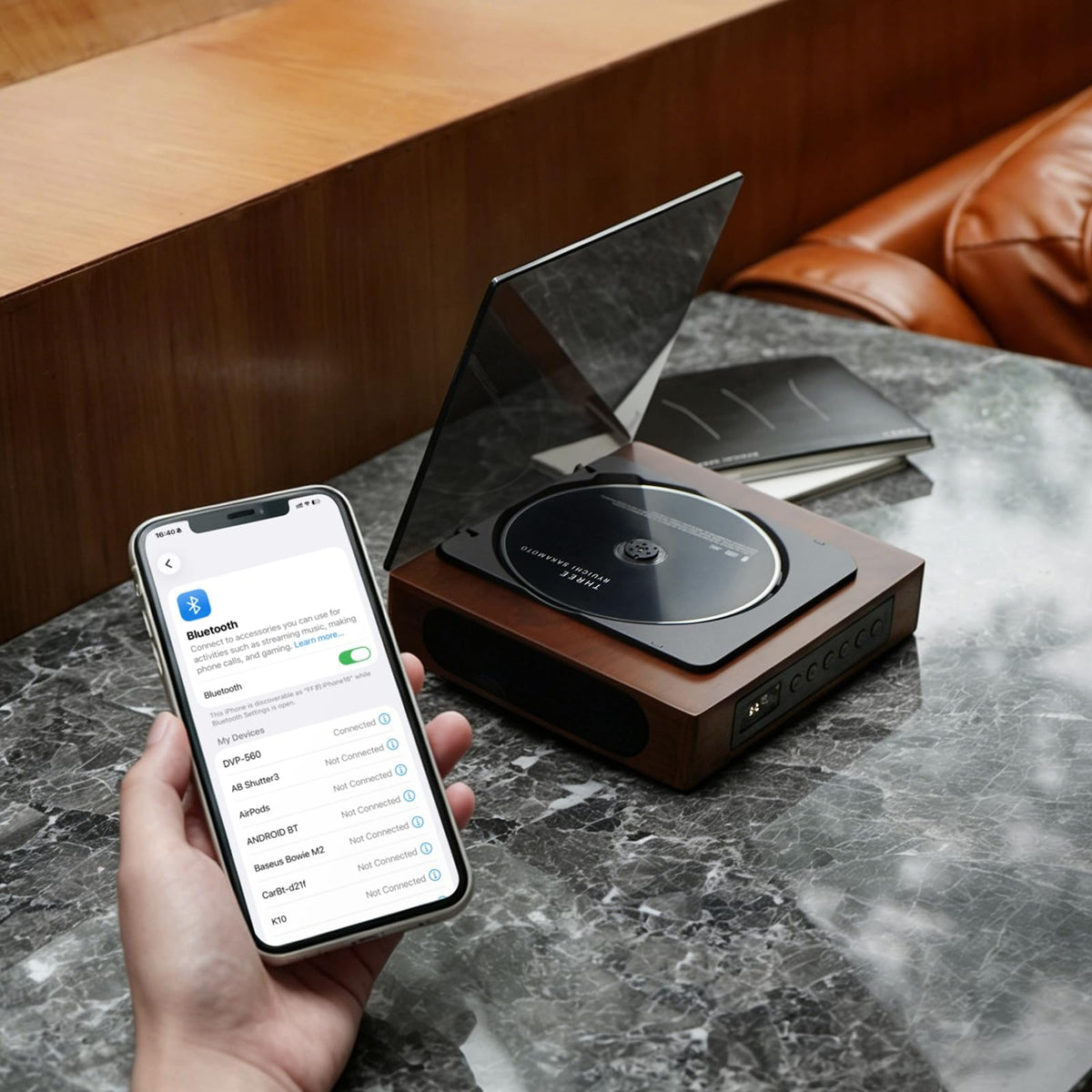 THINKYA streaming to headphones via Bluetooth showing wireless listening freedom