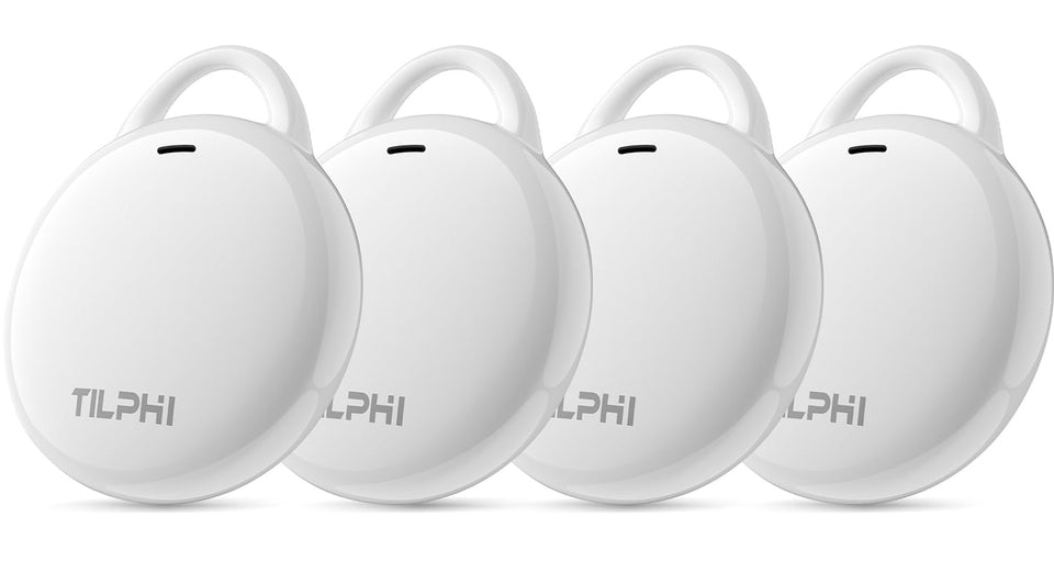 Tilphi Air Tracker Tags four-pack on luggage, compact and attachable.
