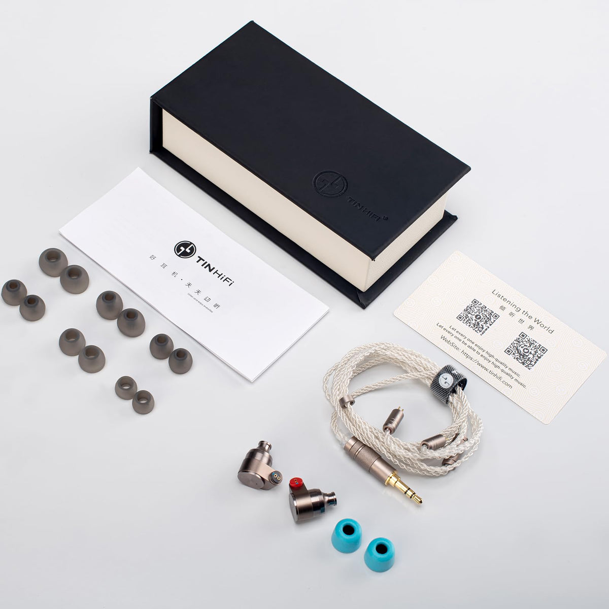 TINHIFI size comparison with coin to indicate compact, portable form factor for travel