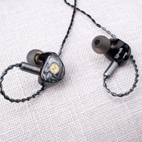 TINHIFI T3 Plus OFC copper 2-pin cable with Kevlar insulation closeup emphasizes durability