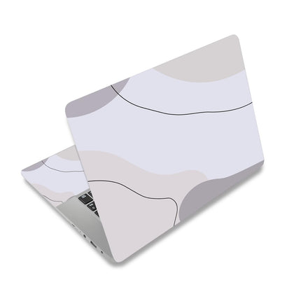 ToLuLu laptop skin top view shows modern brown design protecting against scratches