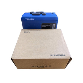 TOMASHI pictured with retro box and USB cable showing gift-ready presentation
