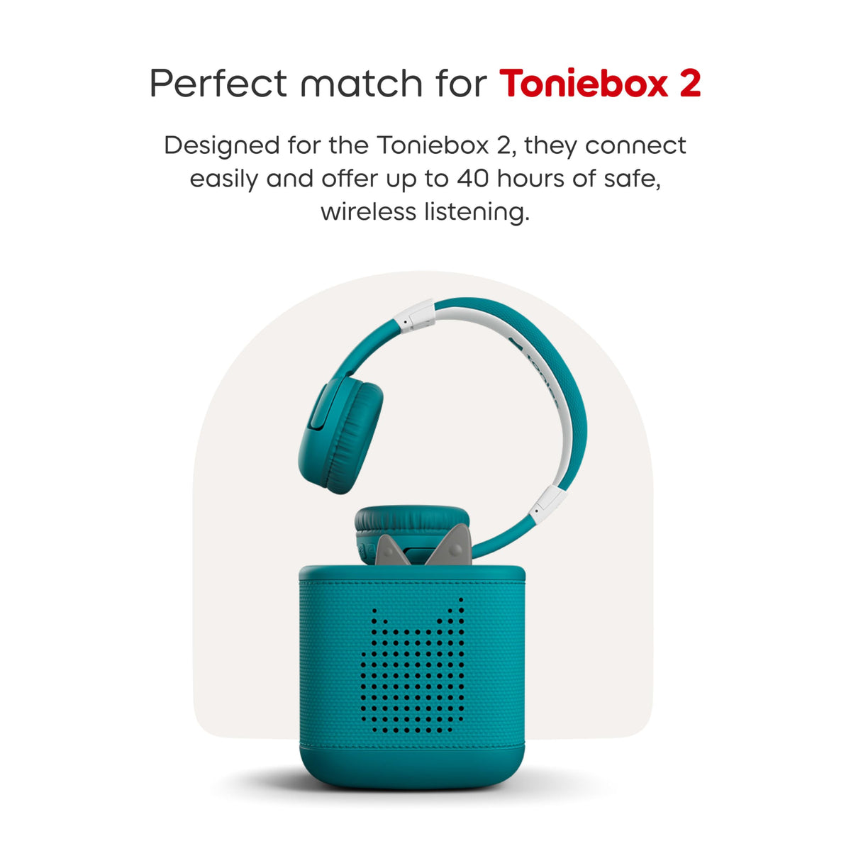 Child wearing Tonies headphones tropical teal enjoying quiet time comfortably