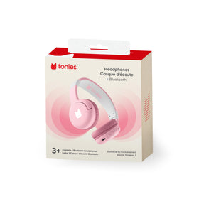 Hand holding Tonies headphones to show scale and portable size for families
