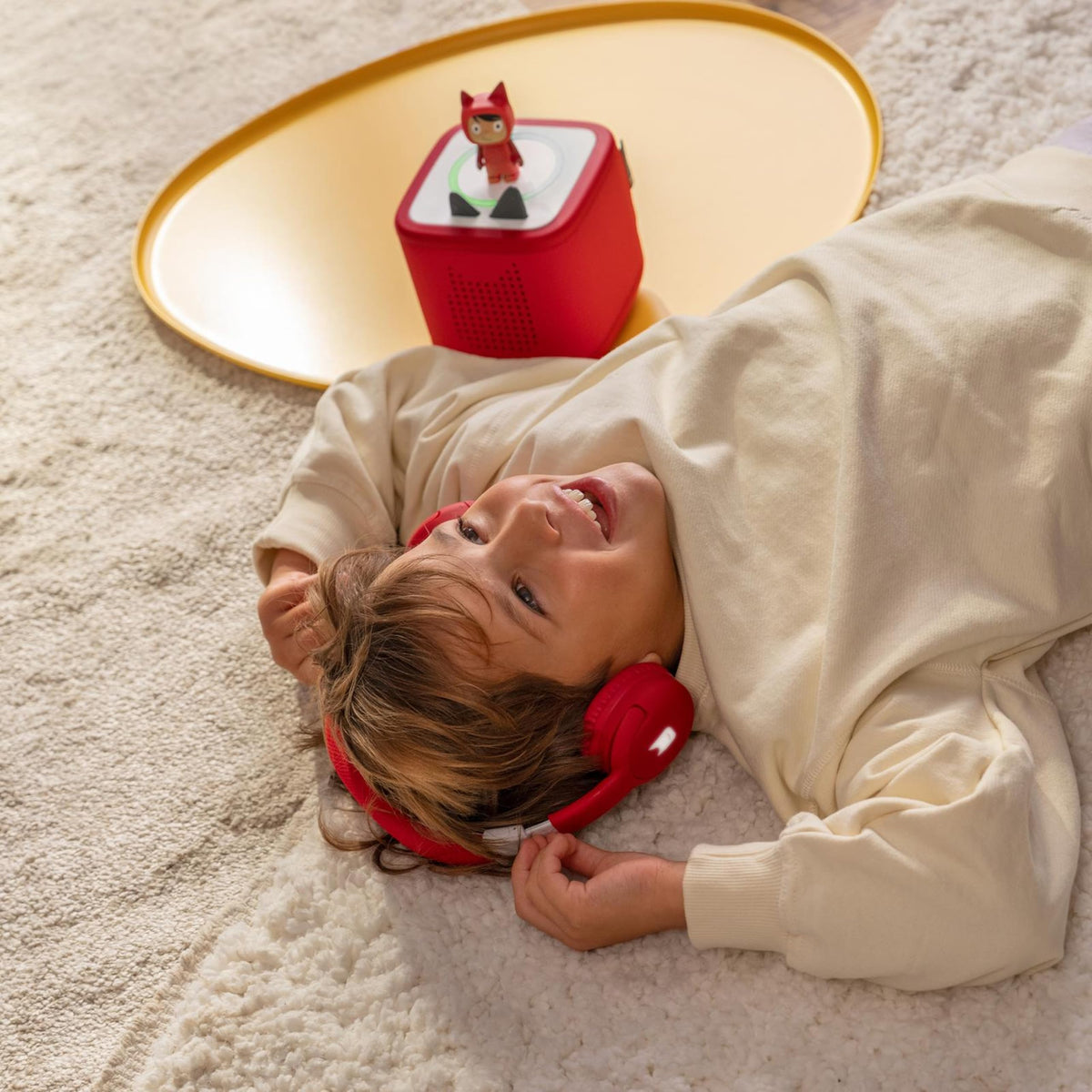 Tonies Sunset Red folded compact for travel, saving bag space and protecting headphones