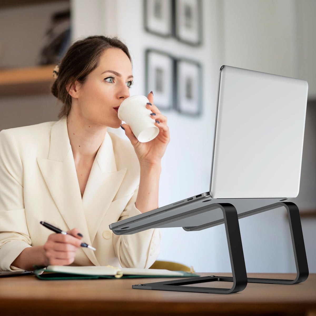 Tonmom next to keyboard showing under-stand storage and space-saving benefit