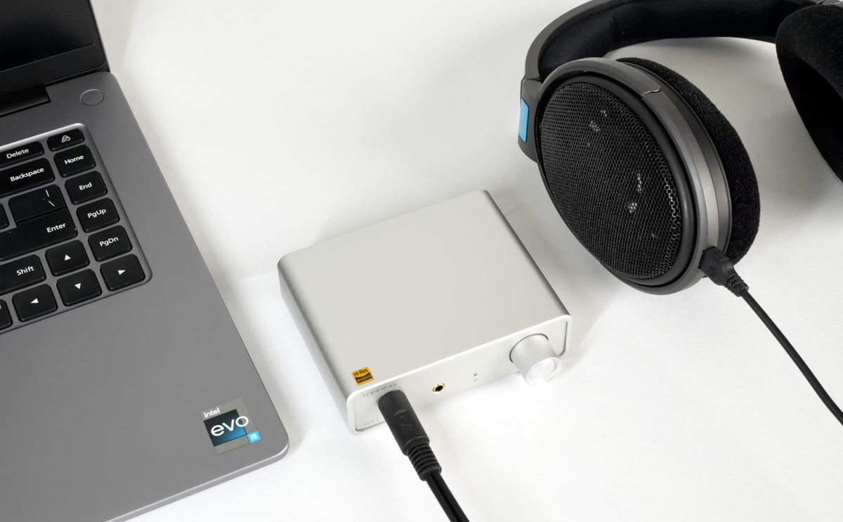TOPPING DX1 back view shows dual outputs for 6.35mm and 3.5mm headphones.