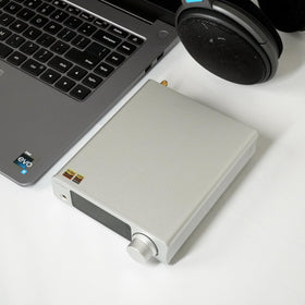 TOPPING DX3Pro+ remote control for on-desk listening tweaks.