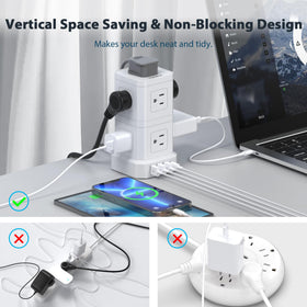 TOPREK power strip in a home office powering monitor, lamp and phone simultaneously