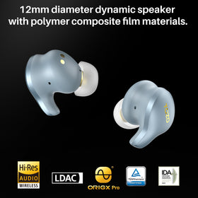 TOZO Golden X1 driver close-up revealing hybrid dynamic and balanced armature clarity
