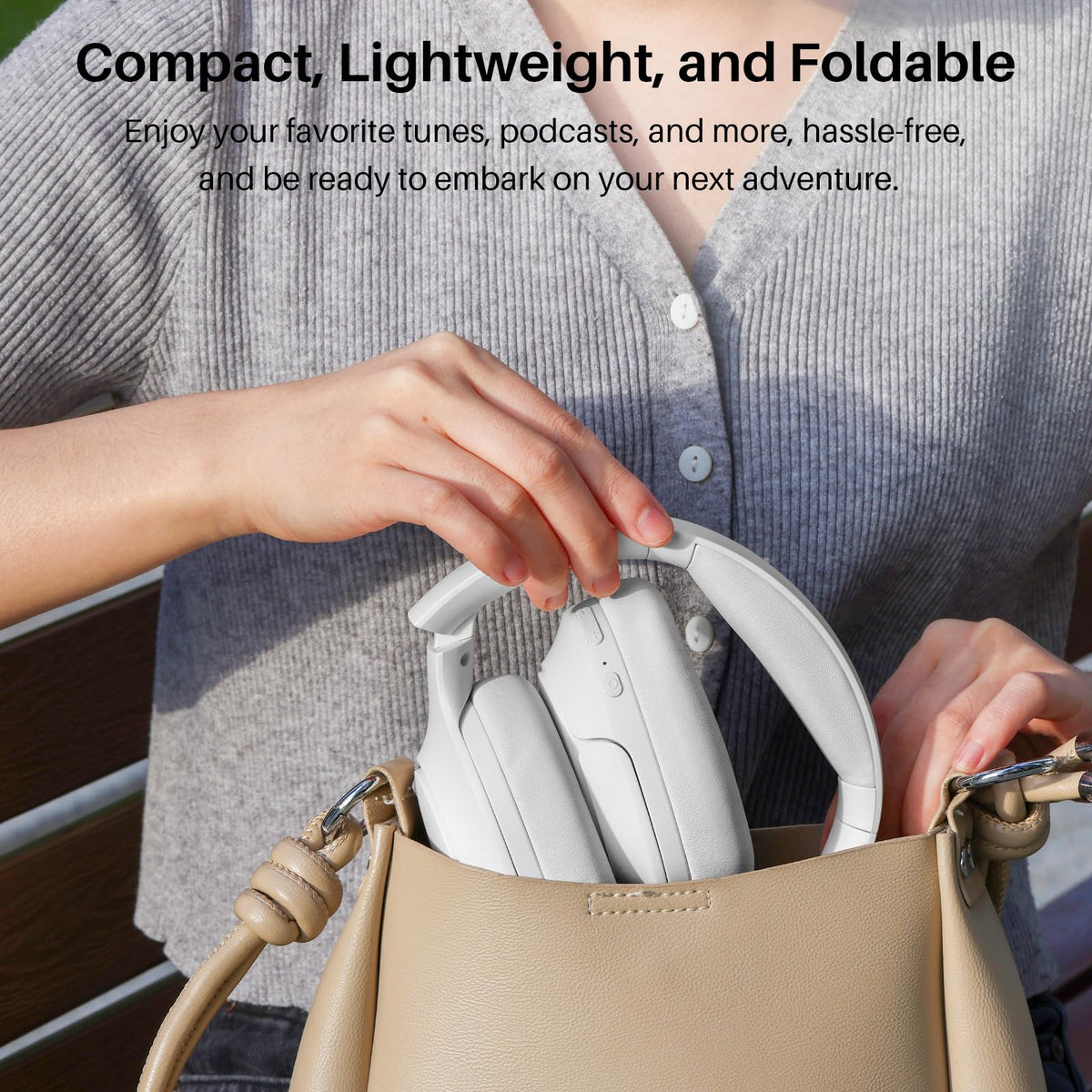 TOZO HT2 on airplane tray table lifestyle image showing ideal travel use