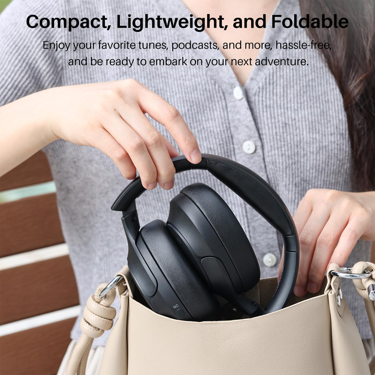 TOZO HT2 worn in office lifestyle scene reducing background noise for focus
