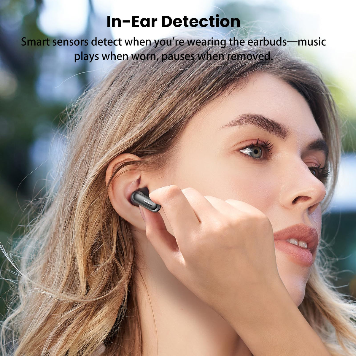 TOZO paired with laptop and phone, demonstrates dual-device switching convenience