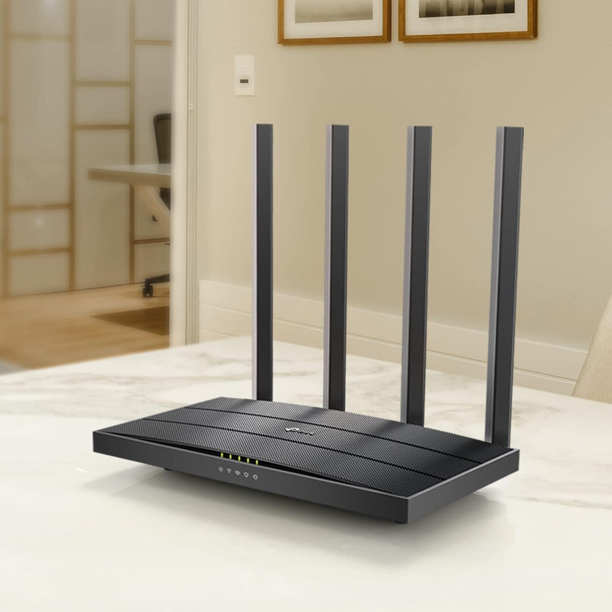 TP-Link Archer A6 size comparison with hand to show compact footprint and placement flexibility